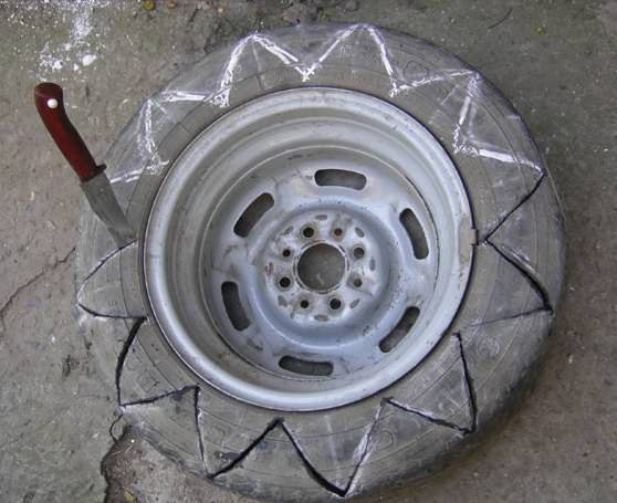 Сооружаем поилку или цветник из старой покрышки