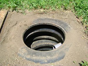 Строительство дренажной ямы для душа из автомобильных покрышек
